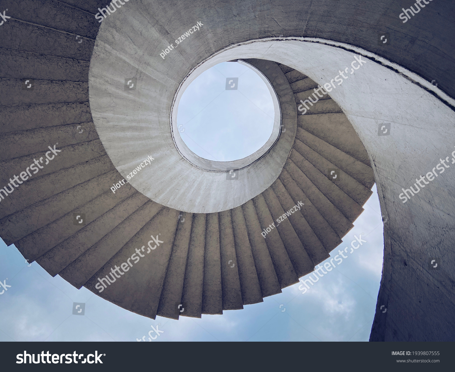 Brutalist spiral staircase with a view of the sky located in Warsaw, Poland #1939807555