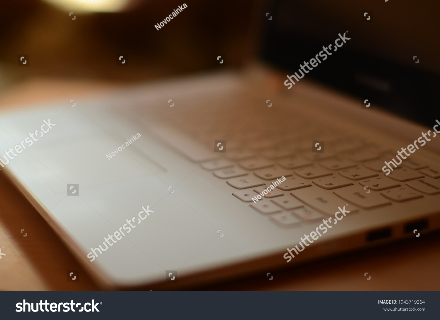Close up white laptop on the wooden table #1943719264