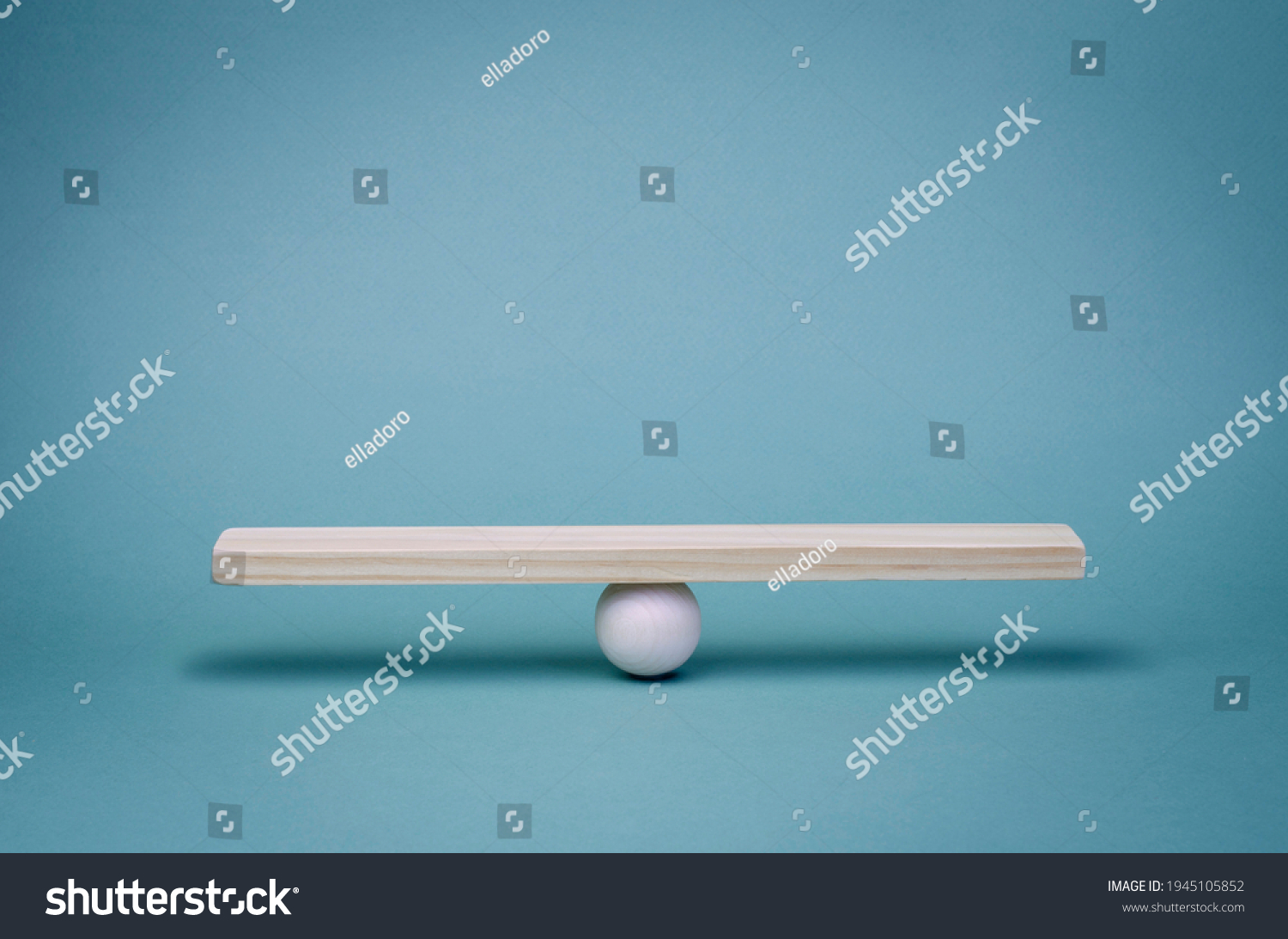 Stability, balance and equality in business partnerships in economic relations. Business finance concept. Wooden scale on a turquoise background. #1945105852