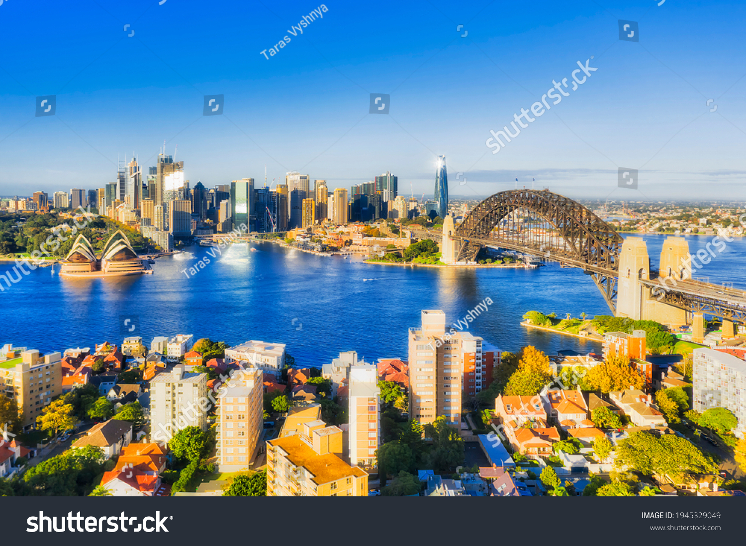 Circular Quay, THe rocks, Barangaroo and major Sydney city architectural landmarks on waterfront of Harbour - aerial view from Kirribilli. #1945329049