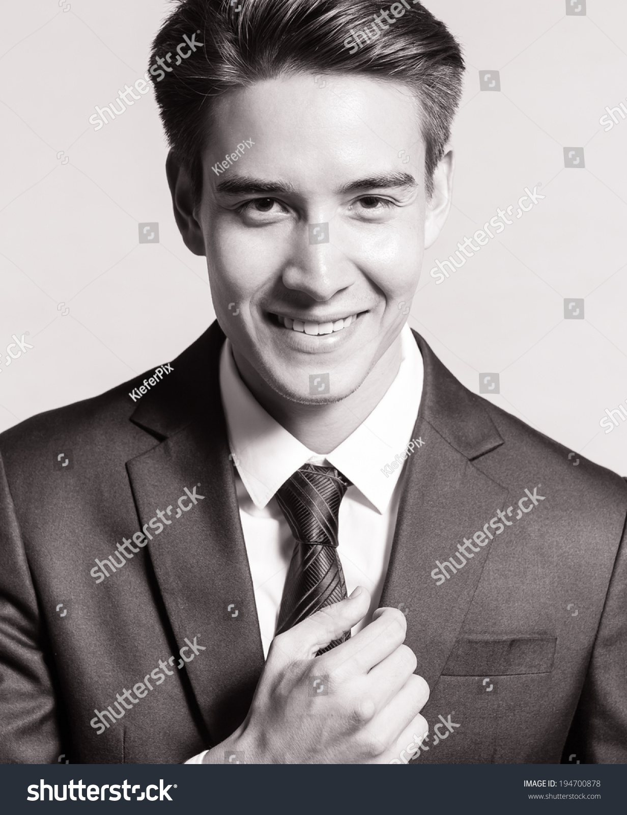 Handsome business man smiling. #194700878