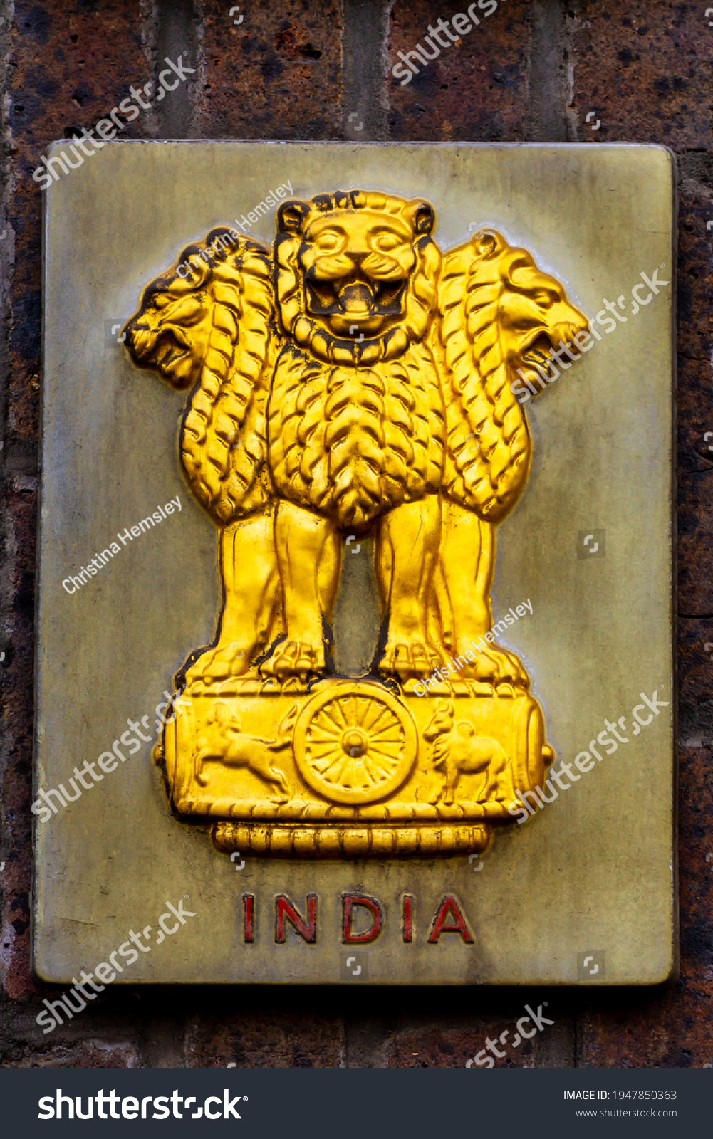 A representation of the Lion Capital of Ashoka was initially adopted as the emblem of the Dominion of India in December 1947 showing 4 lions facing in the four compass directions #1947850363