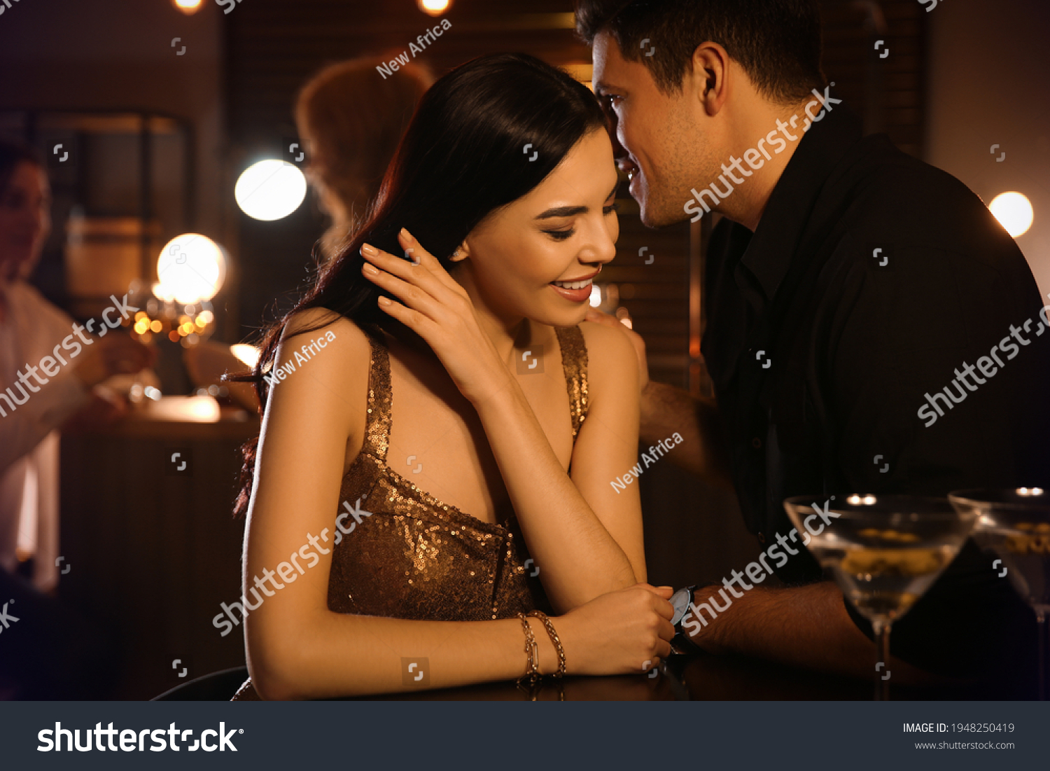 Man and woman flirting with each other in bar #1948250419