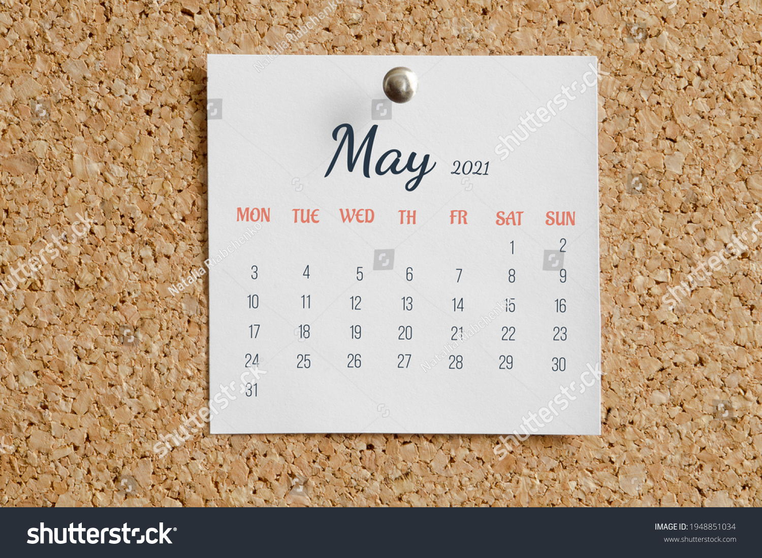Page from the calendar for the full month: May 2021. White calendar sheet is attached to brown cork board. The concept of calendar date. #1948851034