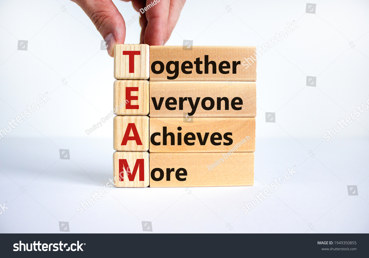 TEAM, together everyone achieves more symbol. Wooden cubes with words 'TEAM, together everyone achieves more'. Beautiful white background, copy space. Business, motivational and TEAM concept. #1949350855