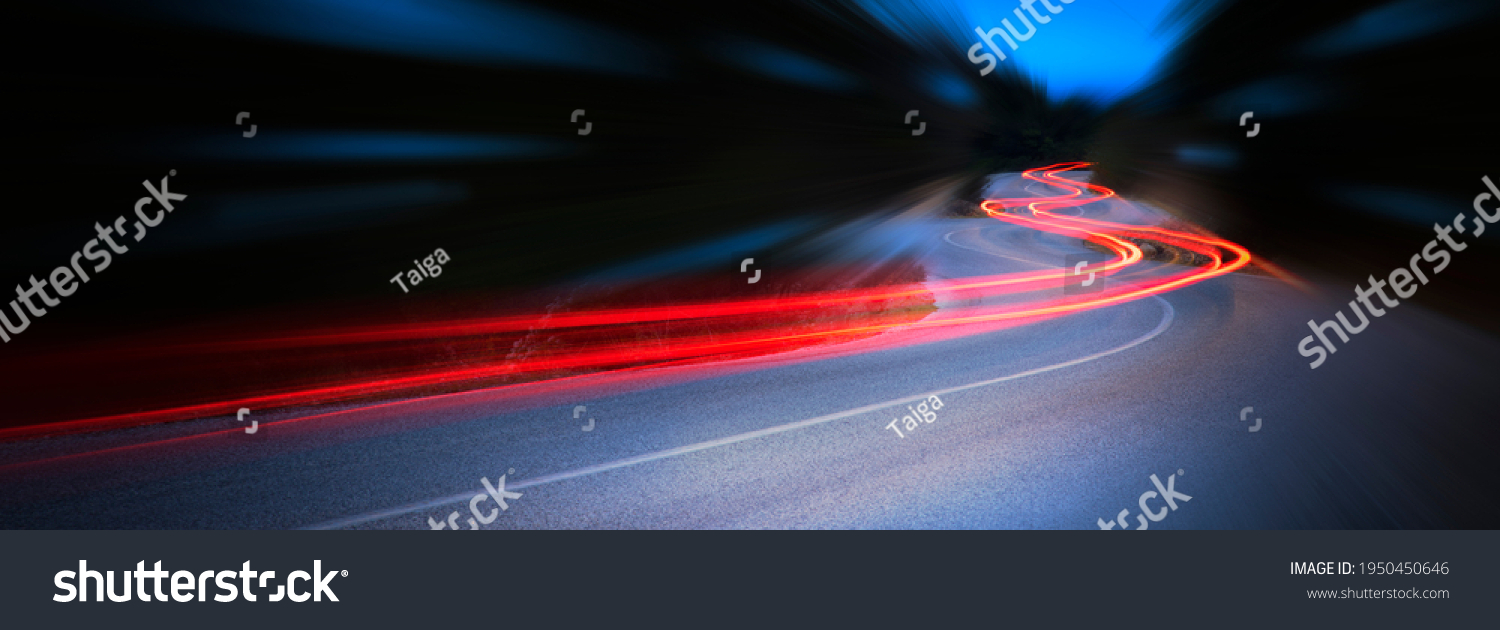 Panoramic - Cars light trails at night in a curve  asphalt road at night, long exposure image #1950450646