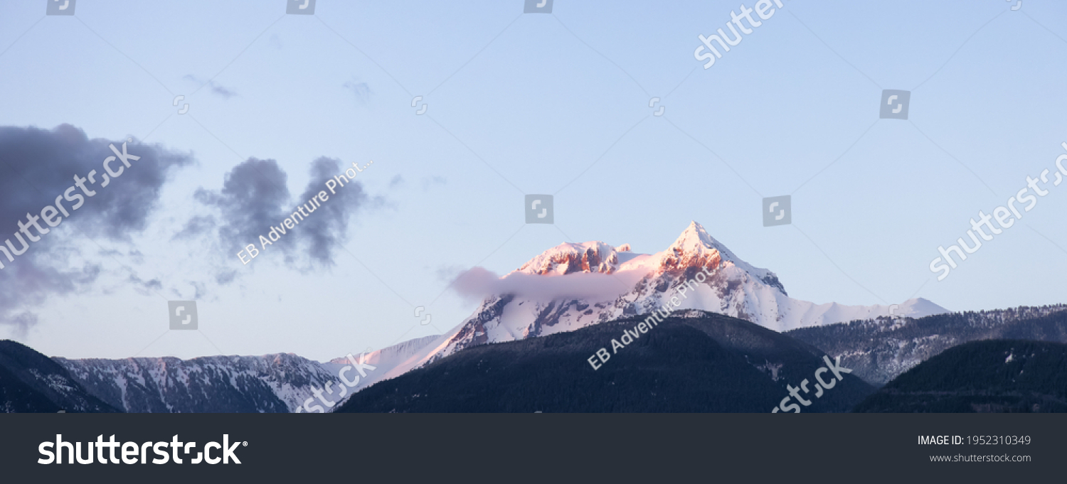 Panoramic View of the Famous Garibaldi Mountain during sunny winter sunset. Located in Squamish, North of Vancouver, British Columbia, Canada. Nature Background Panorama #1952310349