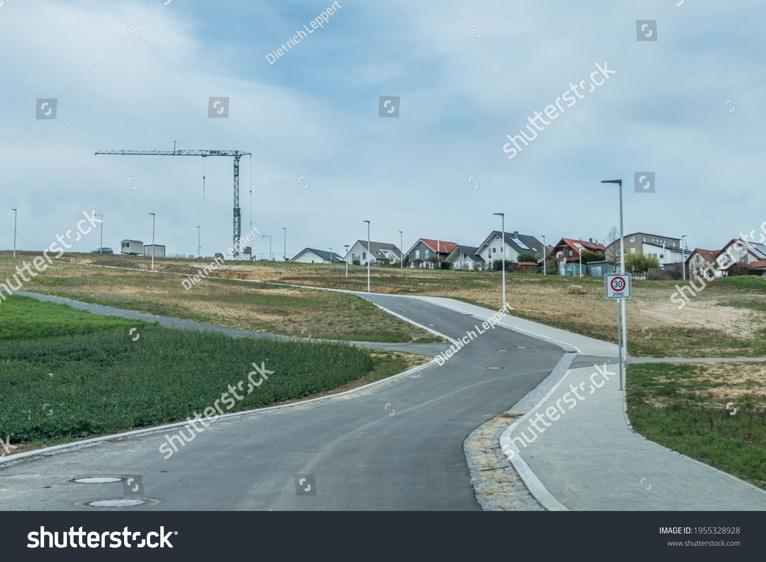 Road construction and new development of a residential area on the outskirts of the village #1955328928