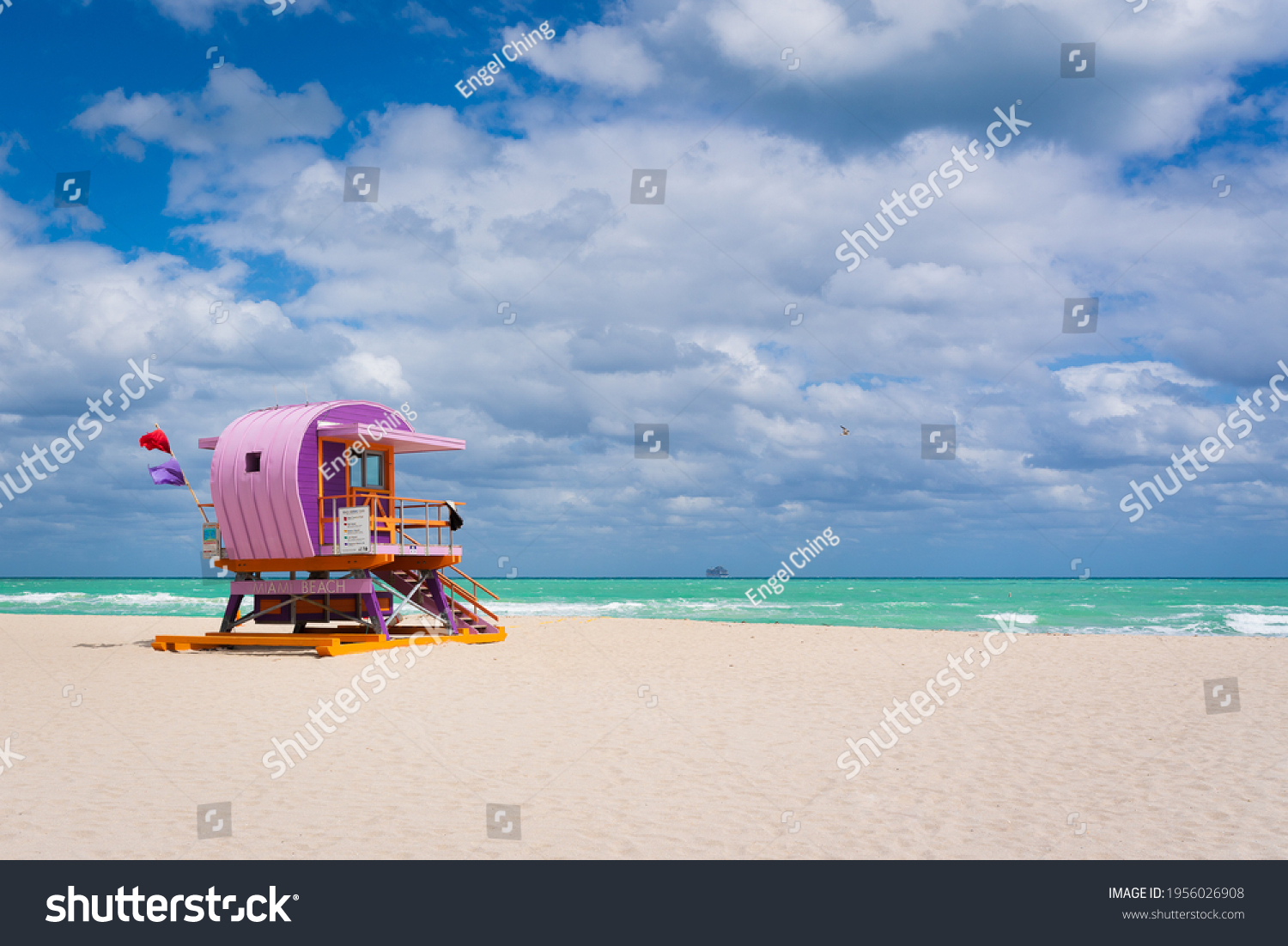 Sunny coastal beach with colorful life guard tower at South Beach, Miami-Dade, Florida USA #1956026908