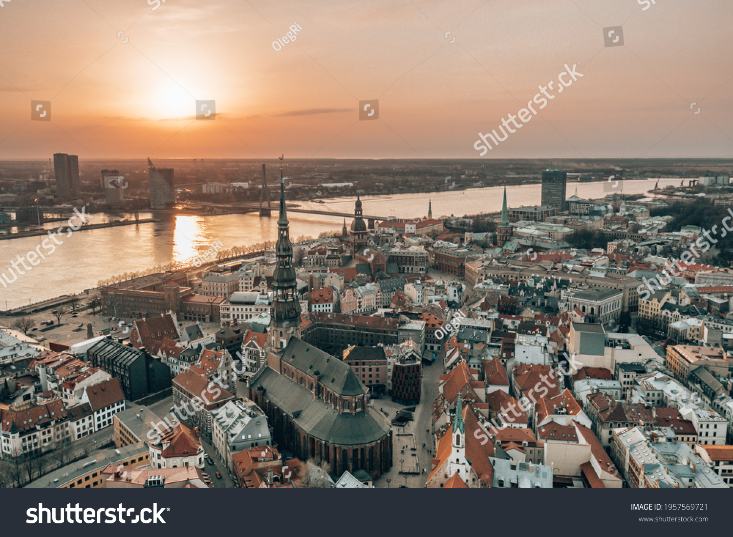 RIga rooftop view panorama at sunset with urban architectures and Daugava River. View of the old town #1957569721