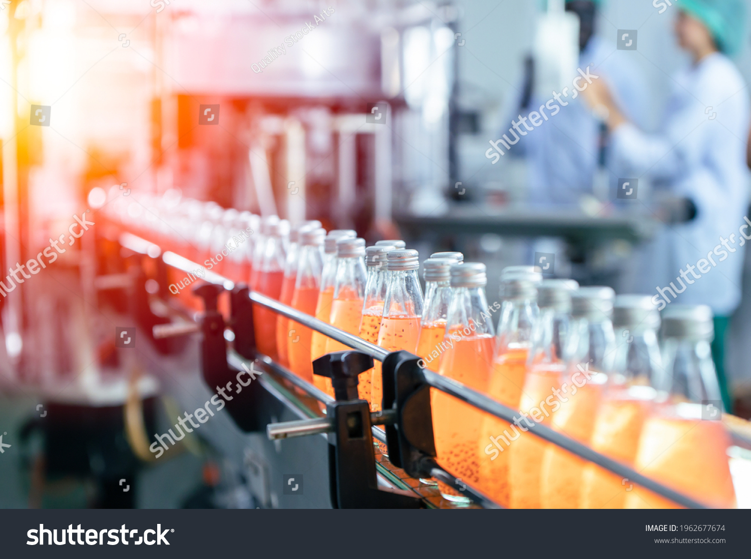 Drink factory production line fruit juice beverage product at conveyor belt. #1962677674