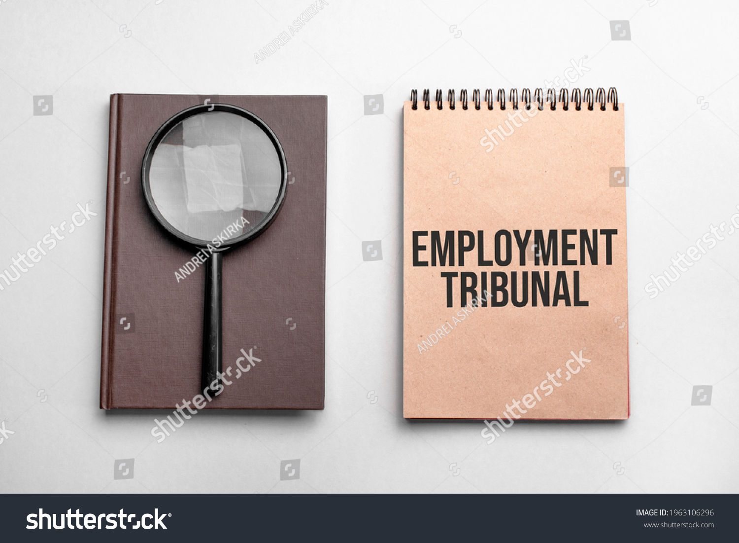 Craft colour notepad with text employment tribunal. Notepad with , magnifying glass. Business concept #1963106296