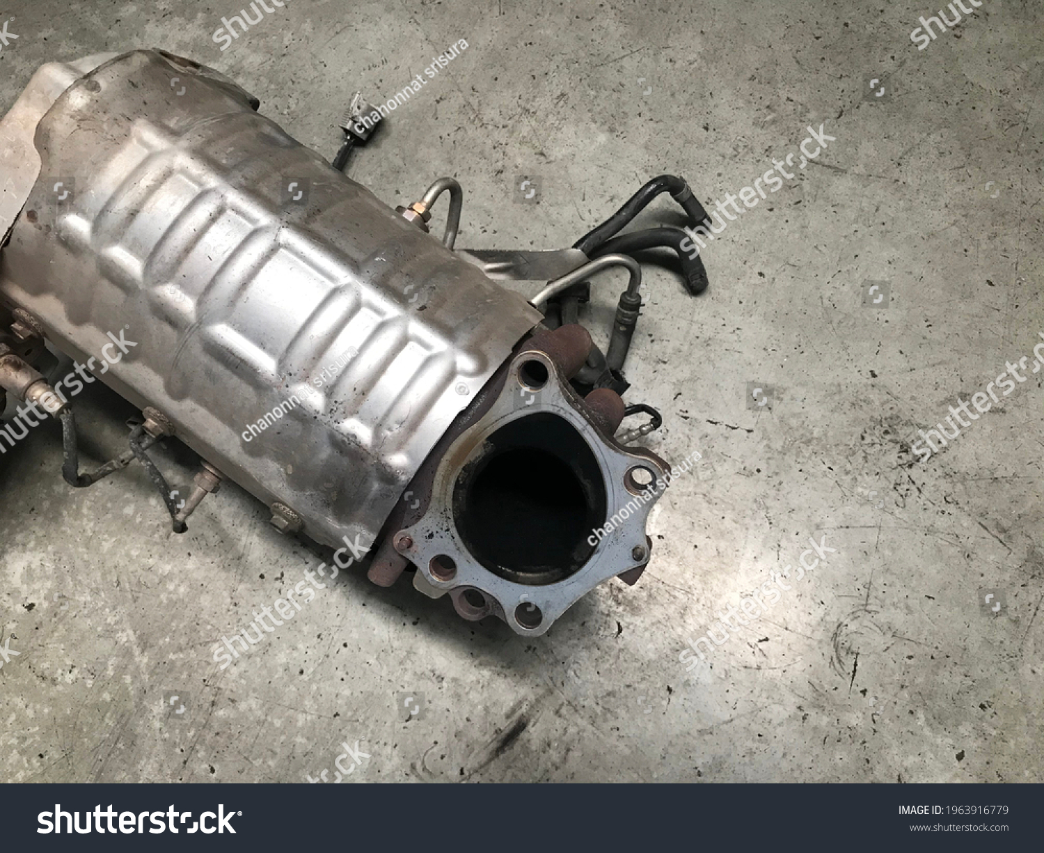 diesel particulate filter or DPF at car repair station. #1963916779