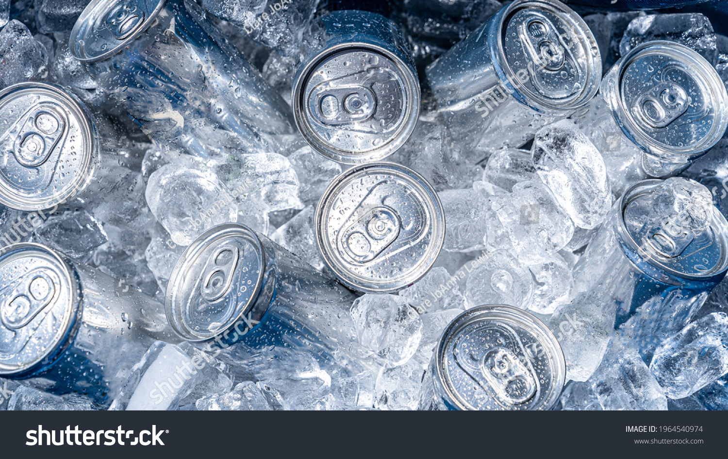 cold cans inside a cooler filled with ice #1964540974