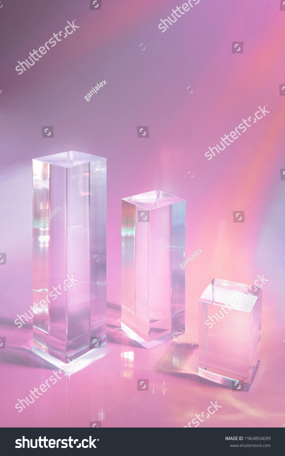 Abstract surreal scene - empty stage with three clear glass rectangle prism podiums on pastel holographic colored background. Pedestal for cosmetic product packaging mockups display presentation #1964854699