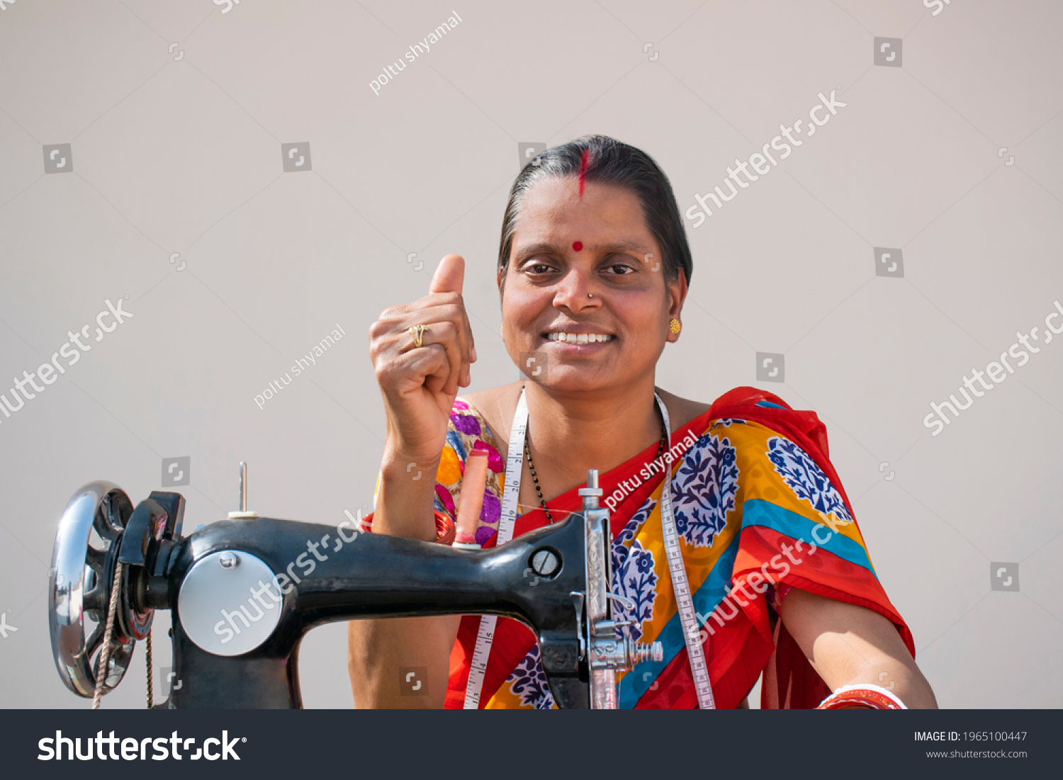 Rural woman Worker Tailor showing Thumbs Up
 #1965100447