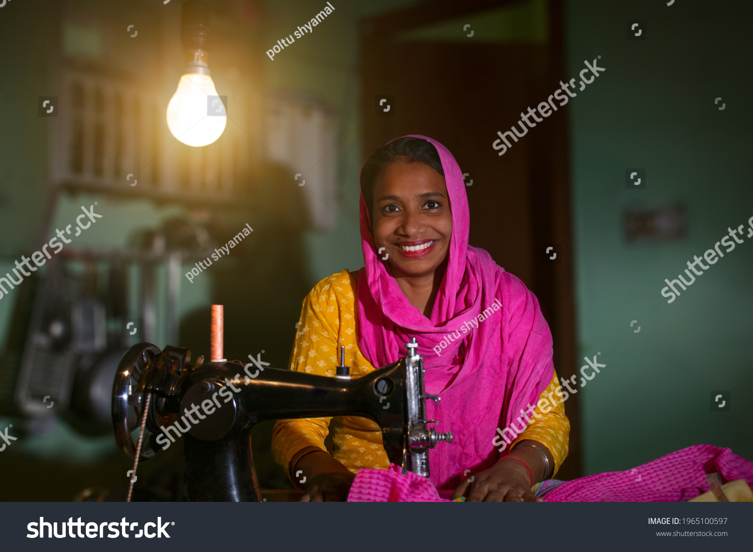 PORTRAIT OF A RURAL WOMAN SEWING CLOTHES
 #1965100597