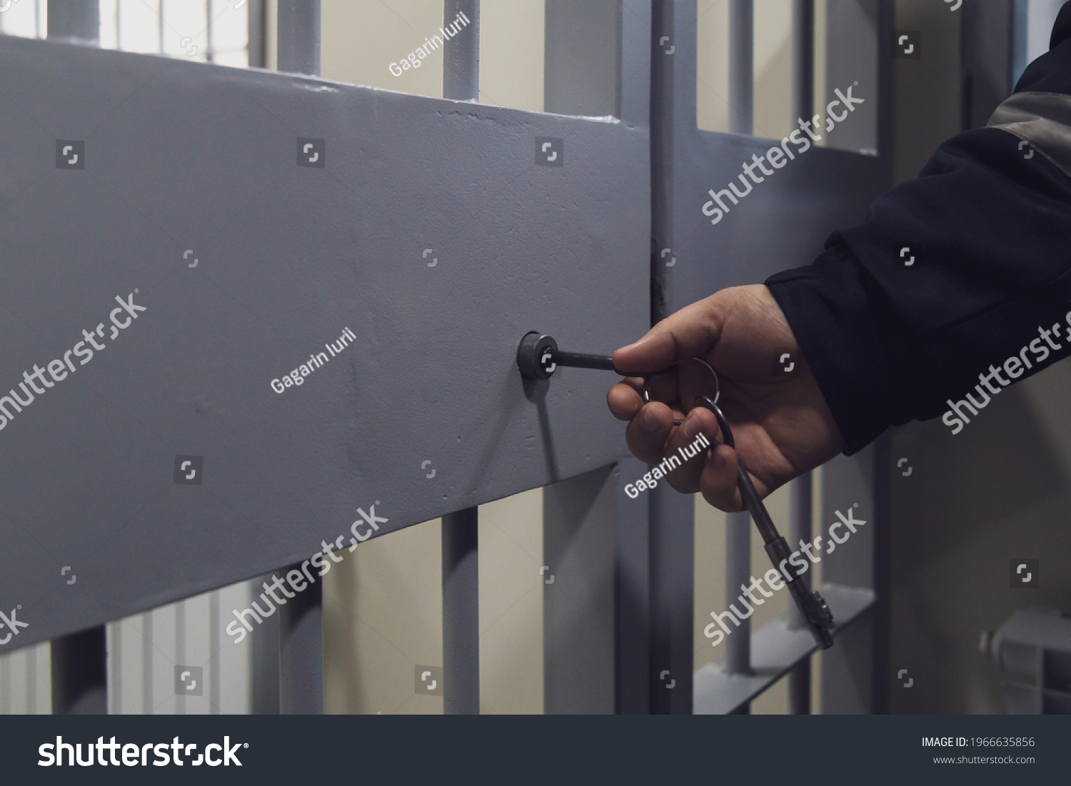 The door of a prison or detention center. Background #1966635856