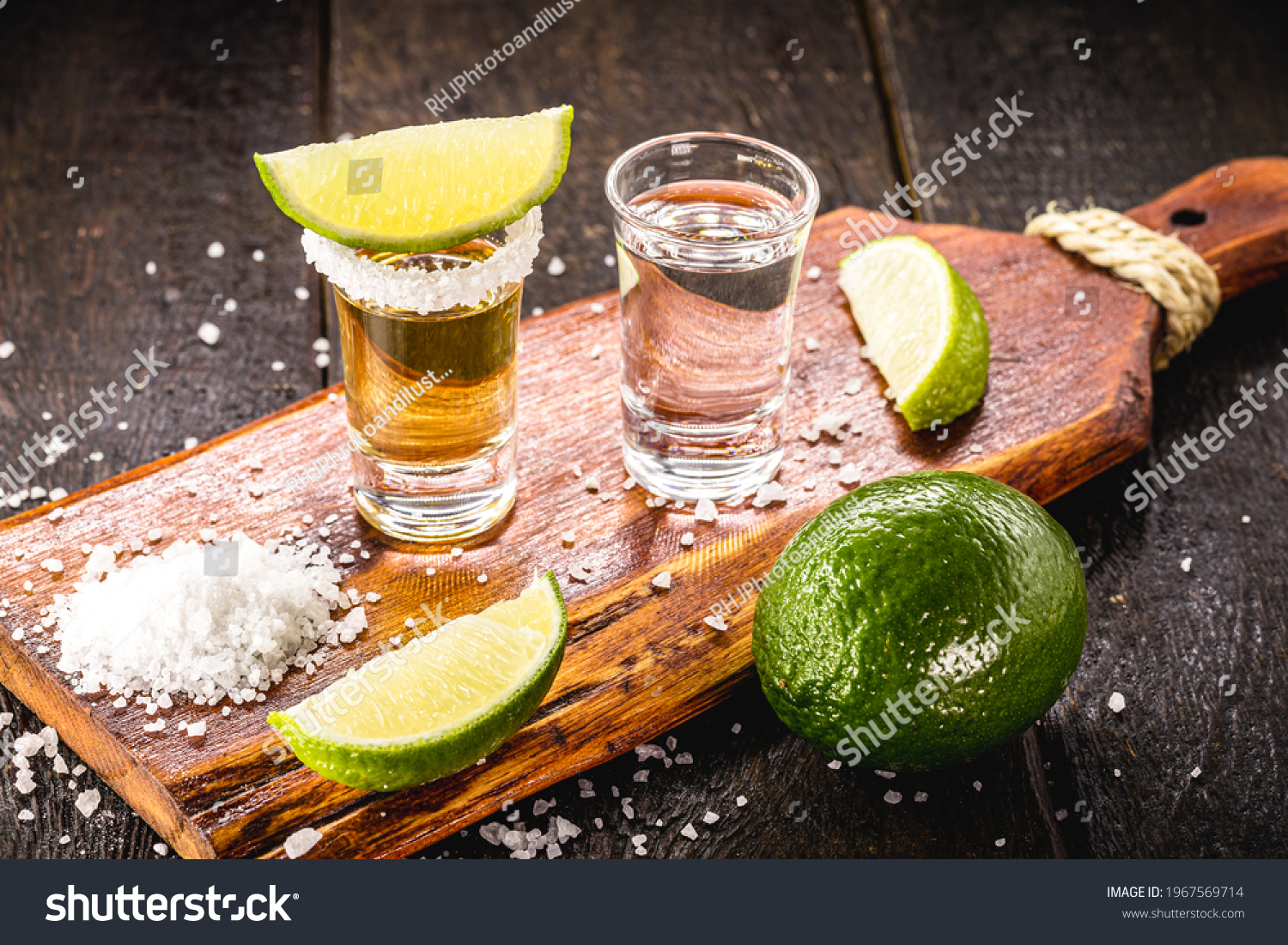 glasses of tequila, gold tequila and silver tequila, typical mexican drink #1967569714