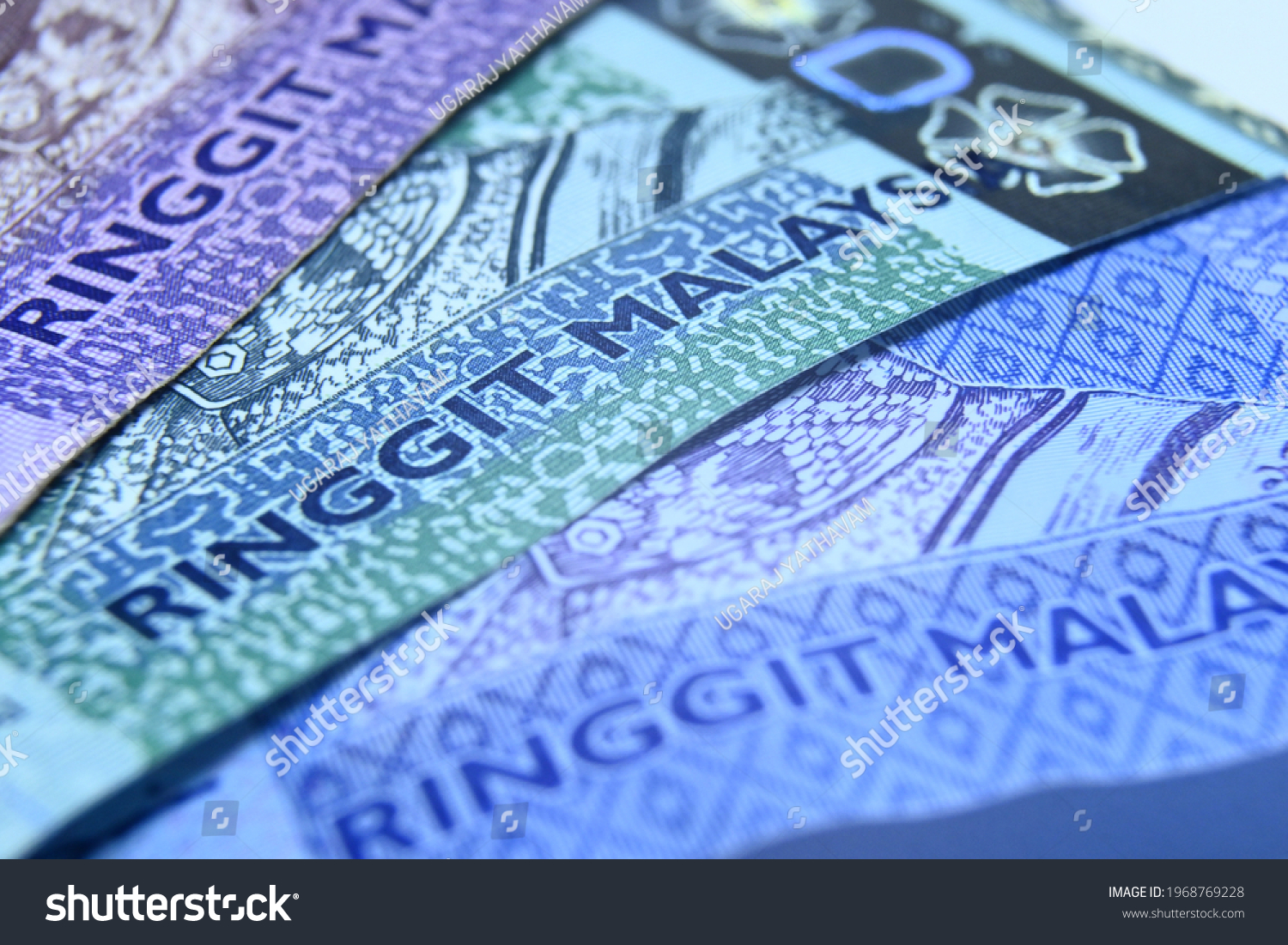 Malaysia Currency (MYR): Stack of Ringgit Malaysia bank note with isolated white background. fifty and hundred ringgit Malaysia #1968769228