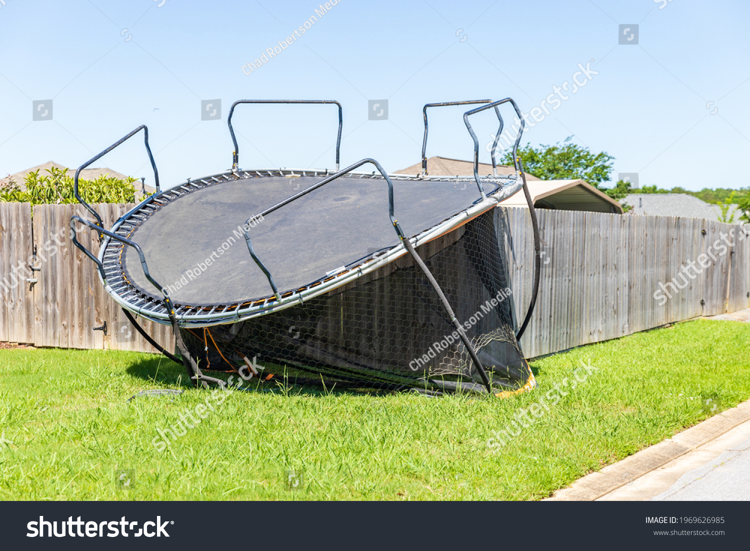 Trampoline damaged and flipped during severe storm #1969626985