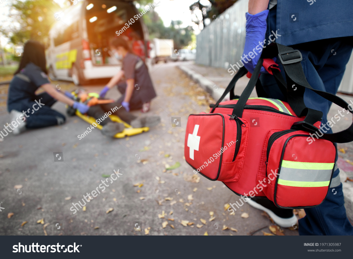 Emergency Medical First aid kit bags of first aid team service for an accident in work of worker loss of function in limbs, First aid training to transfer patient #1971305987