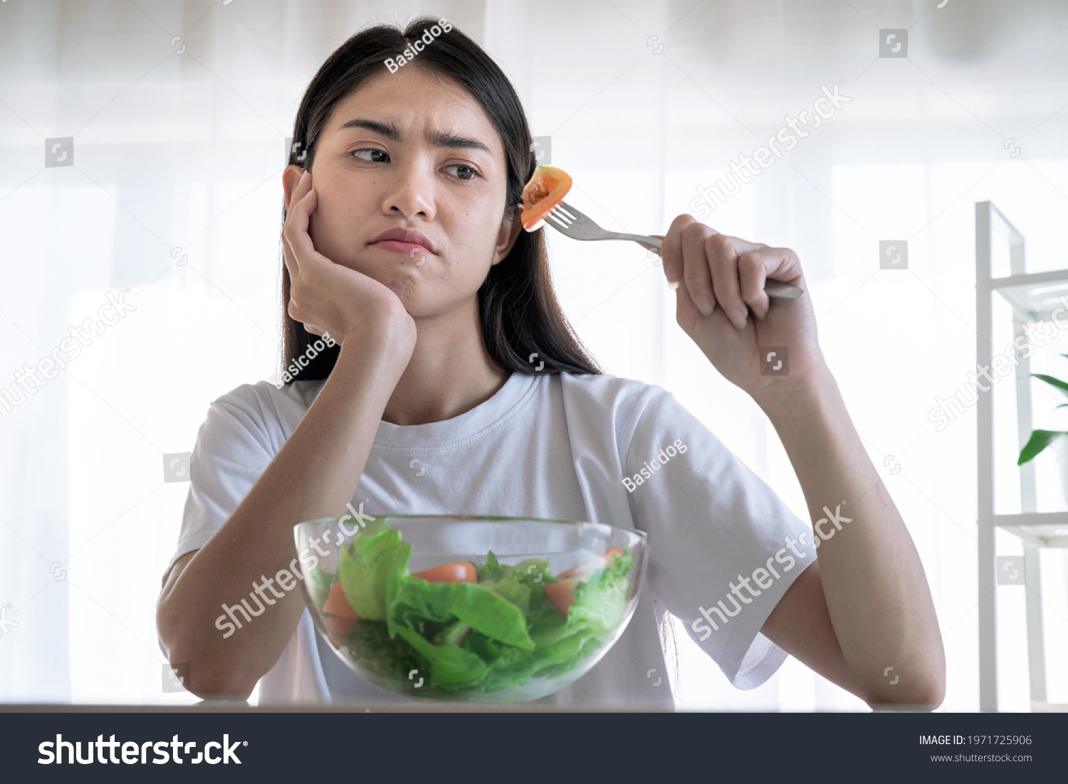 Asian woman feel anorexia, The girl does not like to eat vegetables, Healthy food. #1971725906