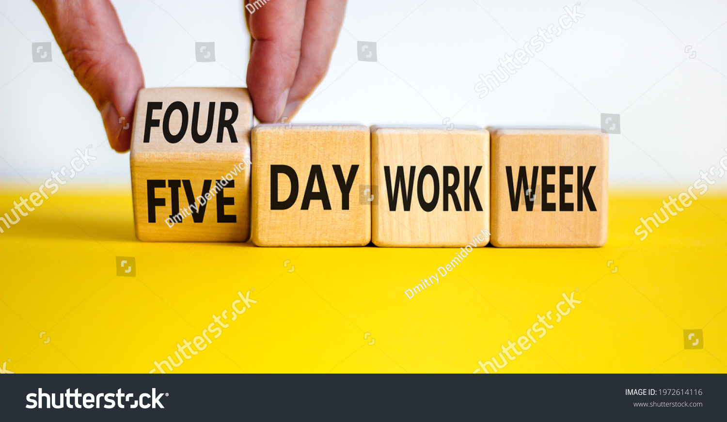 4 or 5 day work week symbol. Businessman turns the cube, changes words 'five day work week' to 'four day work week'. Beautiful white background. Copy space. Business and 4 or 5 day work week concept. #1972614116