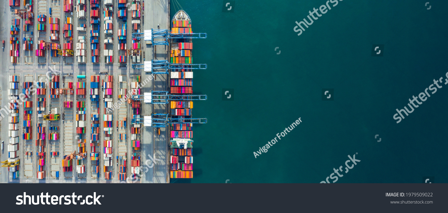Aerial view container ship in port at container terminal port, Ship of container ship stand in terminal port on loading, unloading container, Commercial cargo ship in sea port. #1979509022