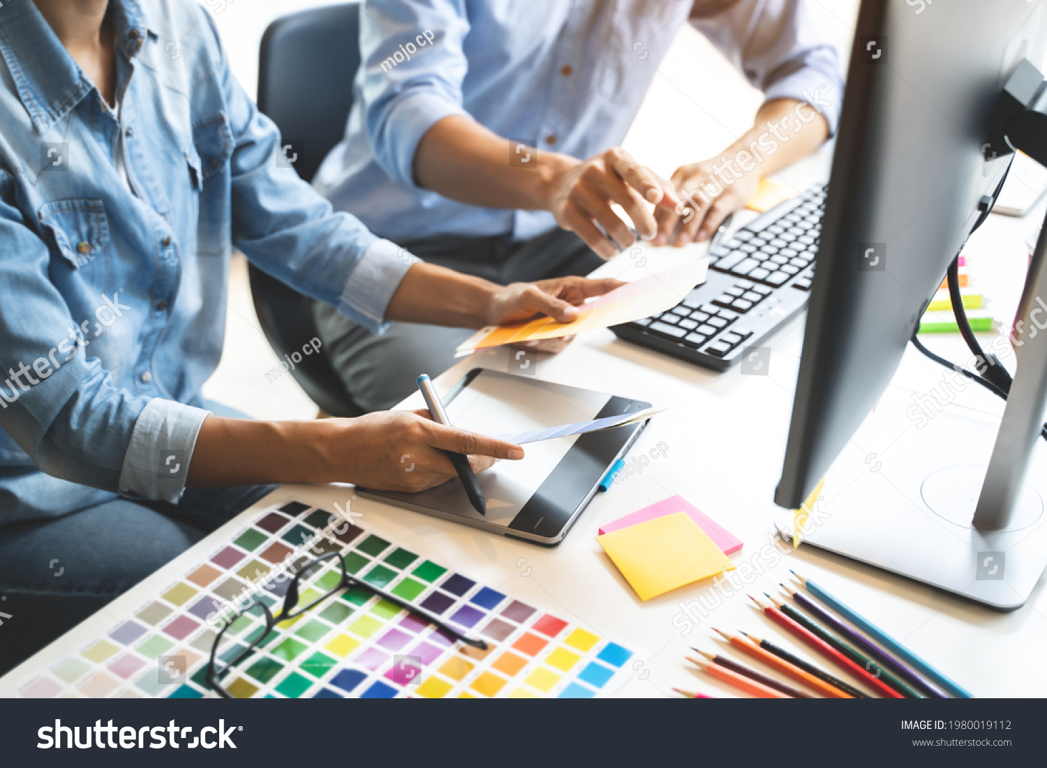 Graphic design using graphics tablet 
drawing creative logo design brand designer sketch with Color swatch samples #1980019112
