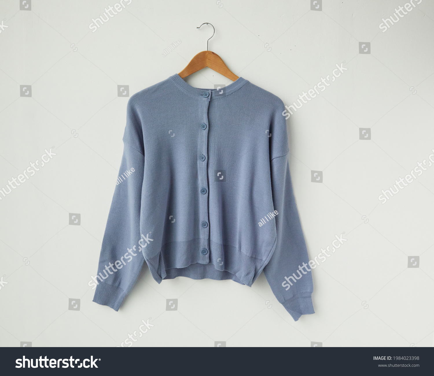 Sky blue cardigan jacket isolated on white background #1984023398
