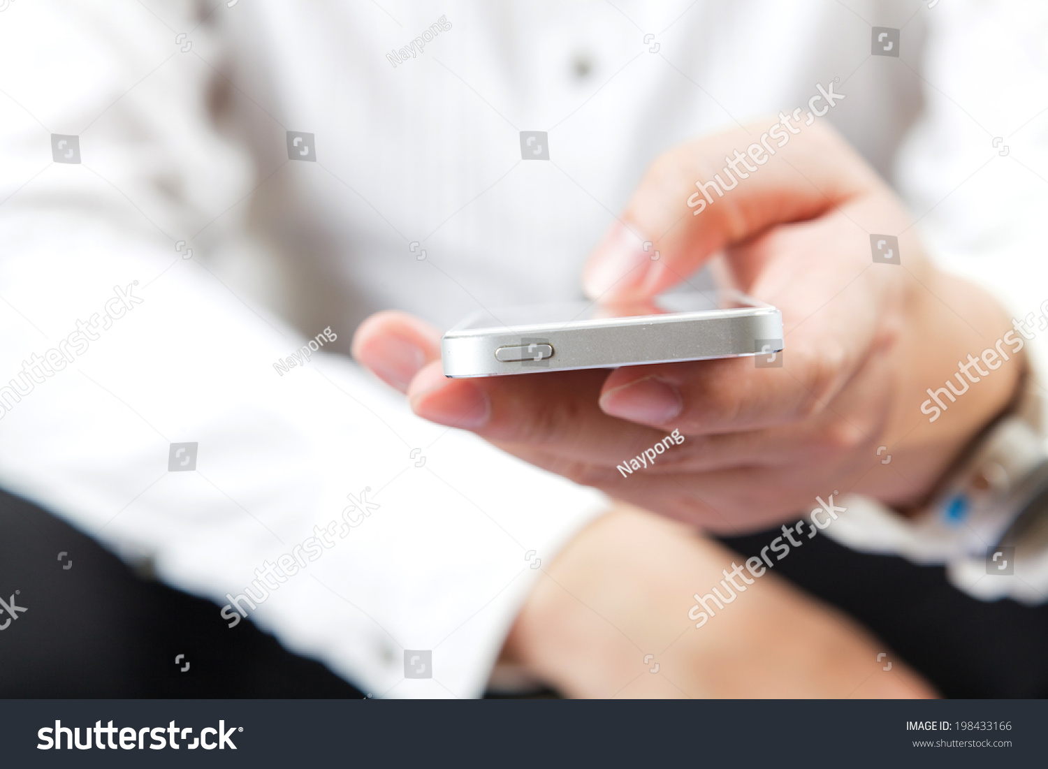 Cropped view of man using mobile phone  #198433166