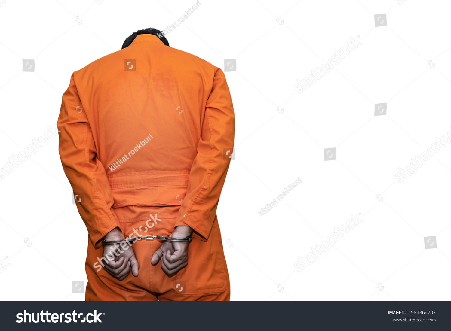 Prisoner in orange robe concept,Portrait of asian handsome man in Prison uniforms,Bandit has a lot of muscle, #1984364207