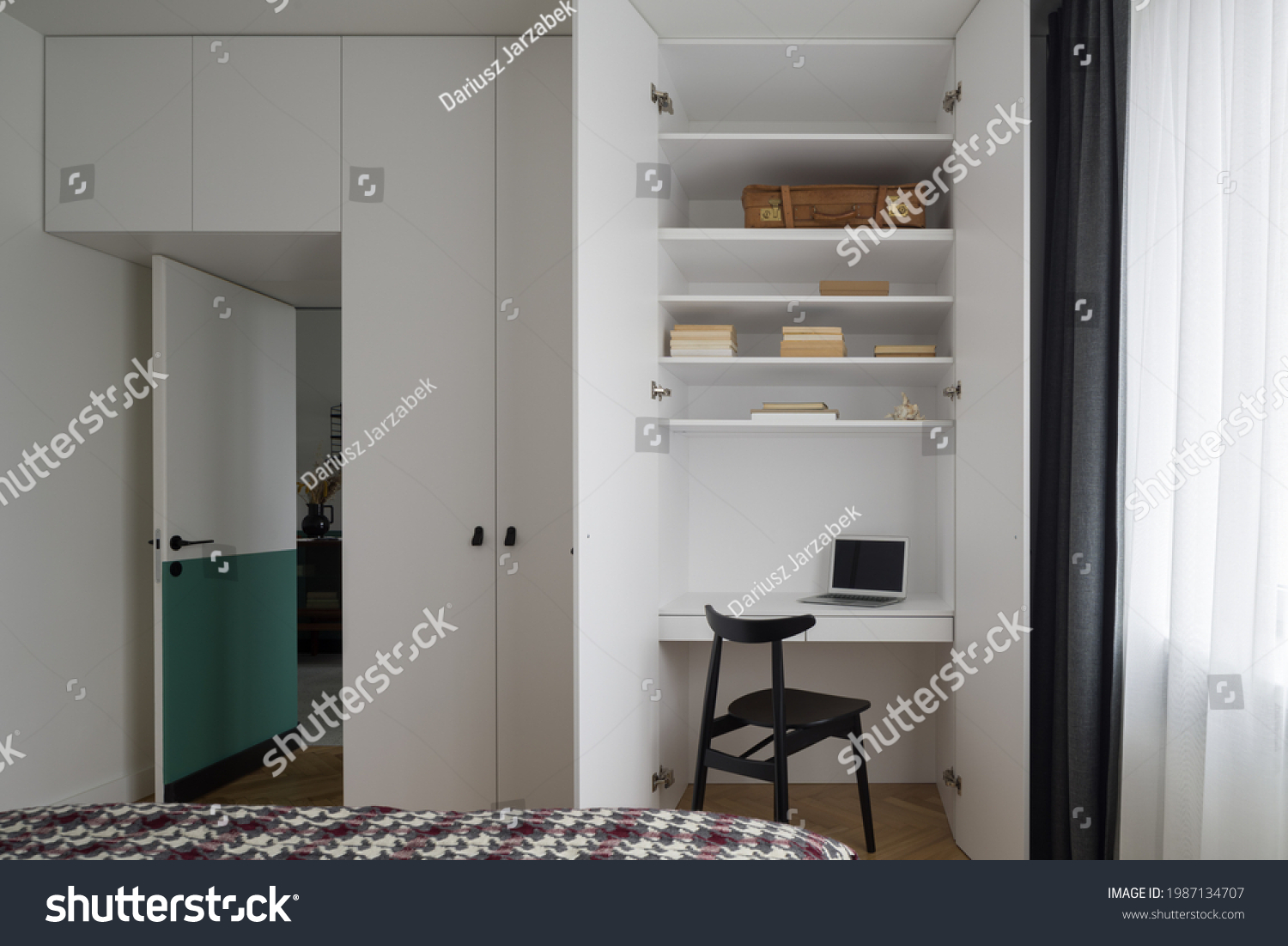 Functional idea with small desk to work in white wardrobe in spacious bedroom #1987134707