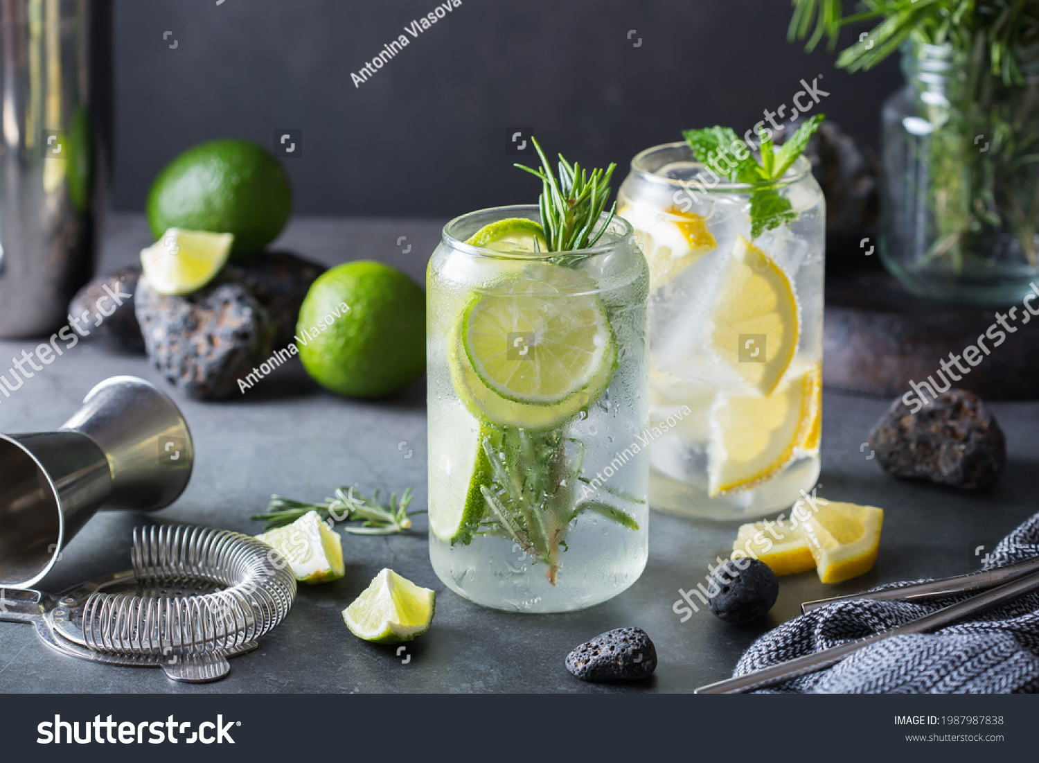 Hard seltzer cocktails with lime and lemon and bartenders accessories #1987987838