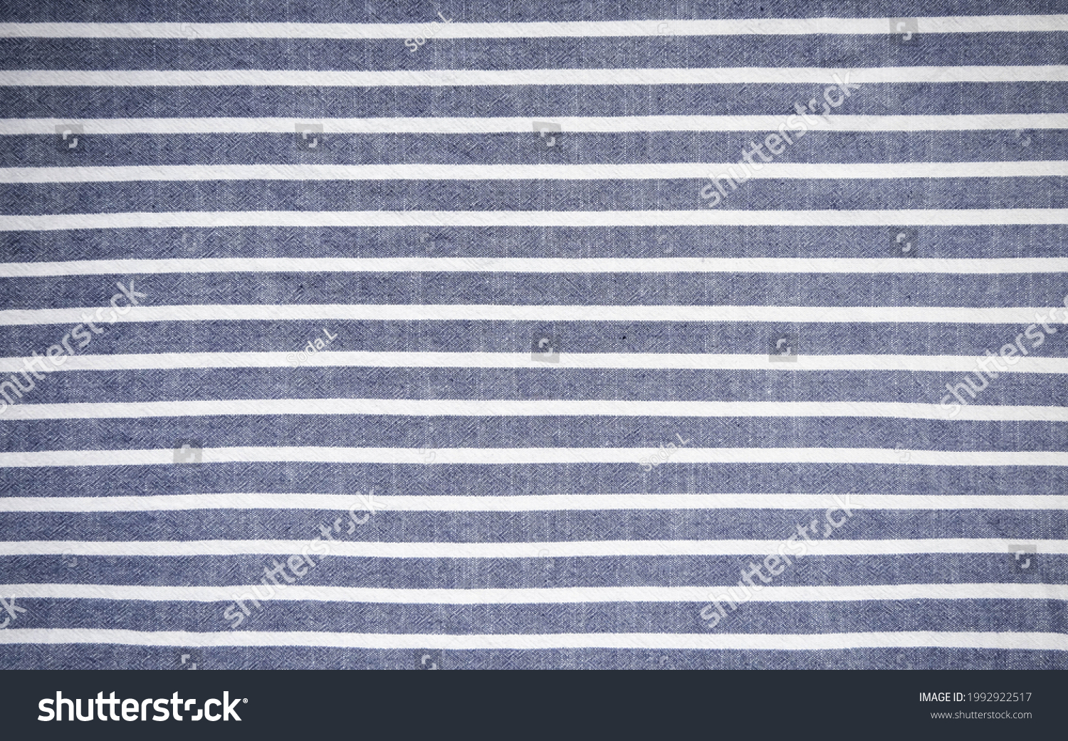Dark blue and white stripes fabric background. #1992922517