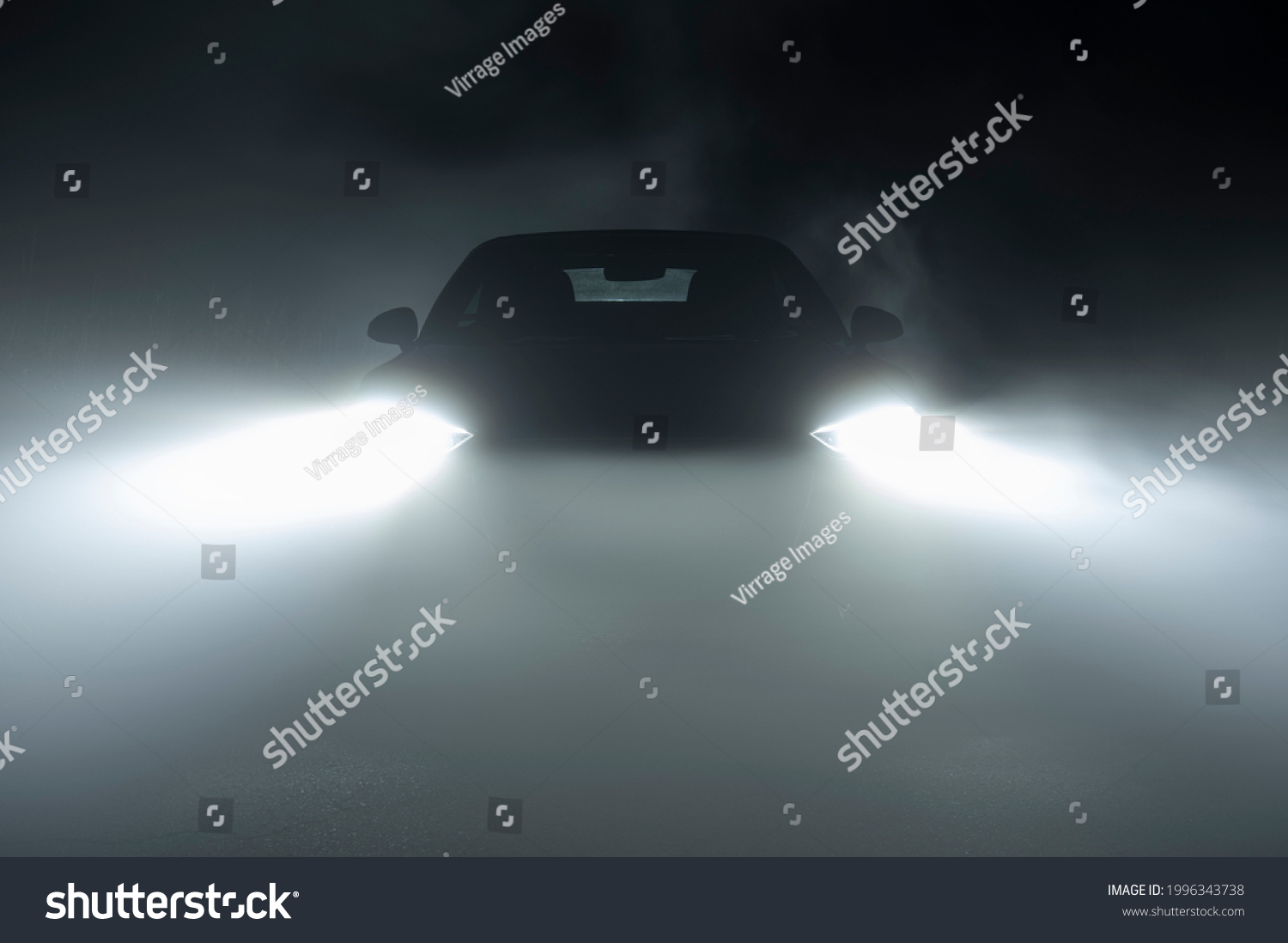Modern LED Car Headlights in Dense Fog Automotive Industry Theme. Hard Road Driving Conditions.  #1996343738