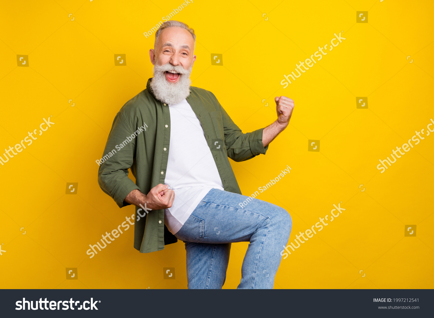 Photo portrait of grandfather smiling happy gesturing like winner isolated vivid yellow color background with copyspace #1997212541