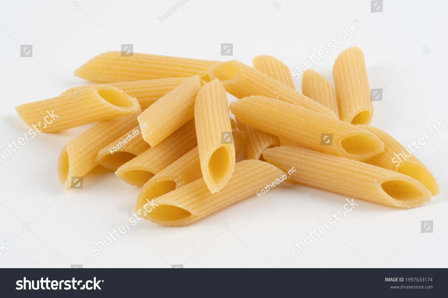 Penne pasta isolated on white #1997633174