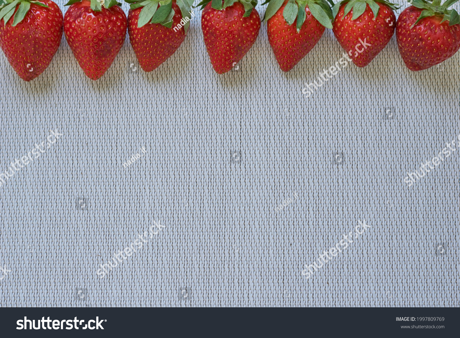 Fresh strawberries on white background, space for text. High quality photo #1997809769