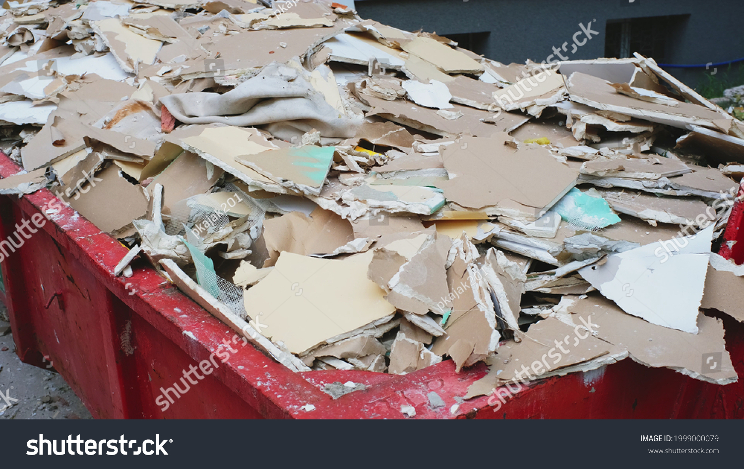 Pile of Hazardous Construction Materials Waste In Large Metal Garbage Dump Container Bin #1999000079
