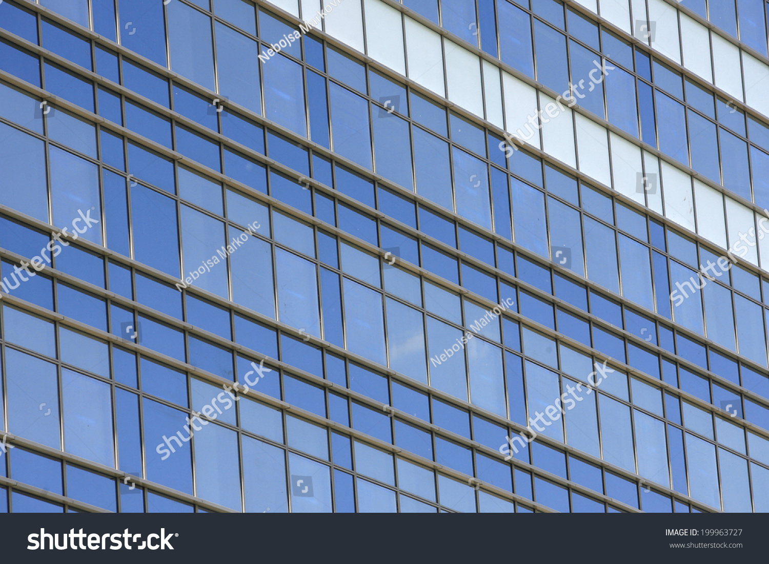 Clouds reflected in windows in the office building #199963727