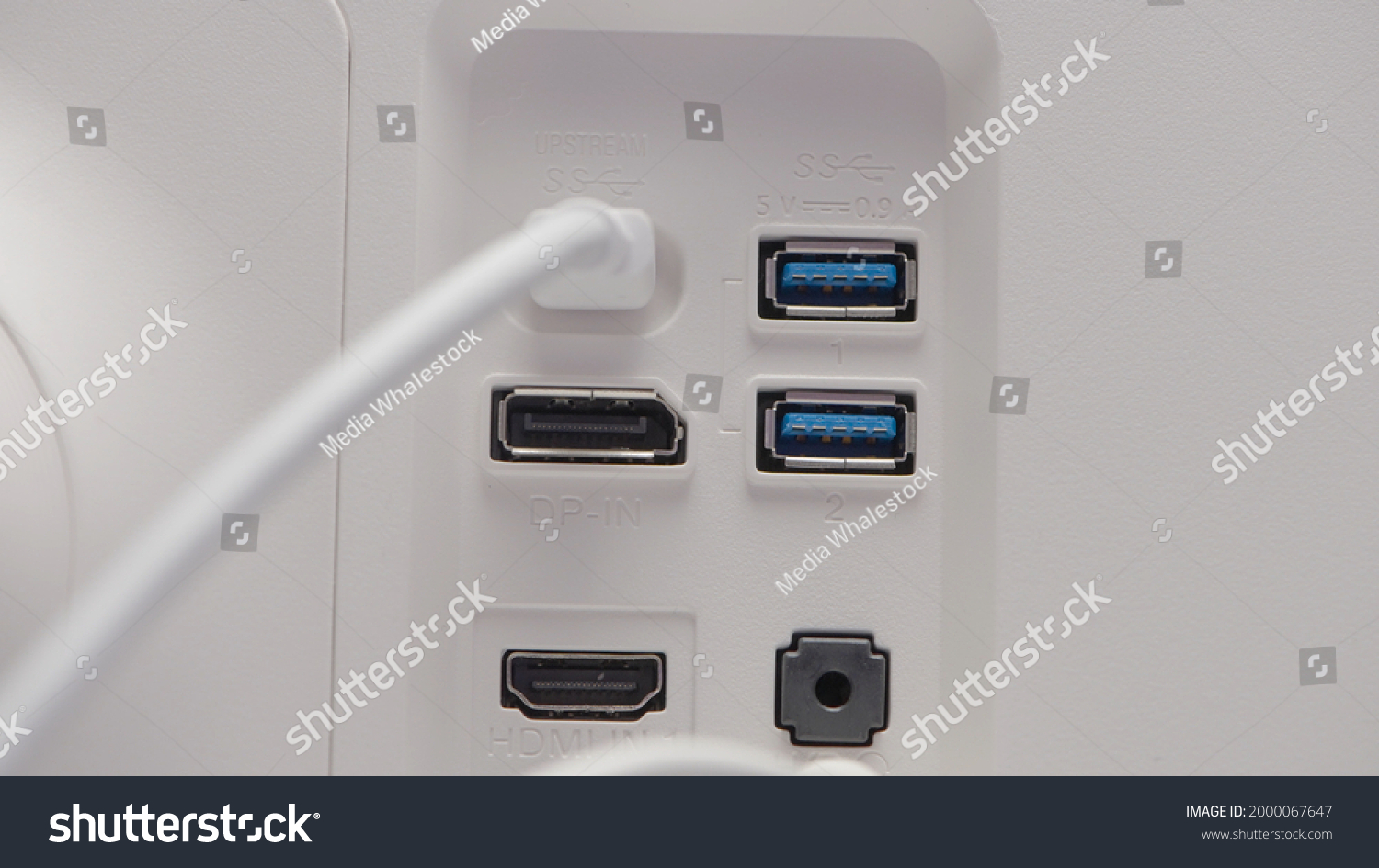 White computer with USB inputs. Action. Cables connected to some inputs of processor with lot of usb. Inputs for connecting usb cables on white background #2000067647