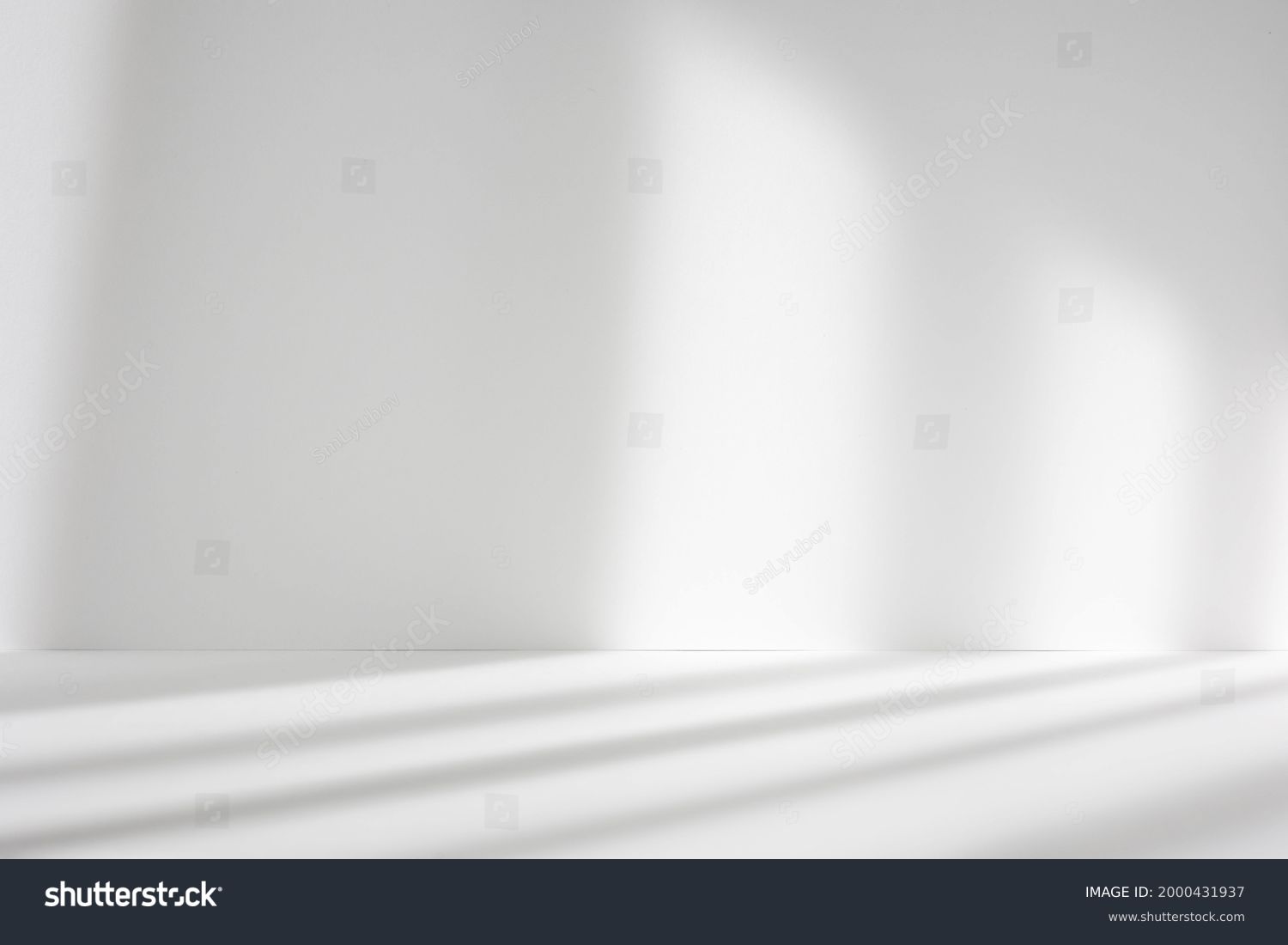 Abstract white studio background for product presentation. Empty room with shadows of window. Display product with blurred backdrop. #2000431937