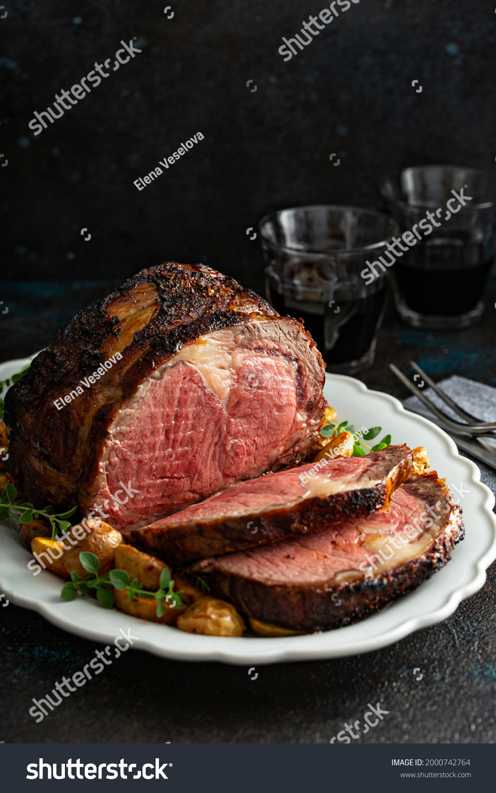 Prime rib boneless beef roast sliced for a holiday or celebration dinner #2000742764