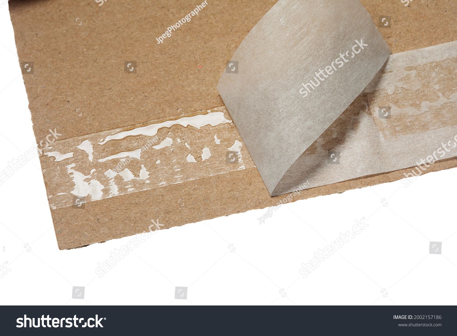 Sticky area for resealing a cardboard package, close up #2002157186