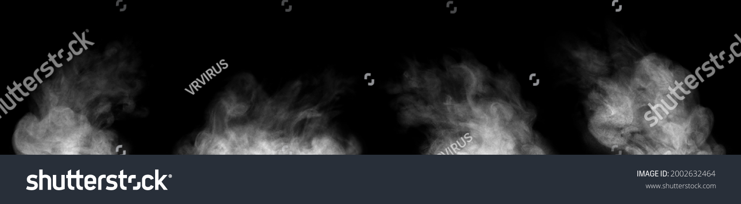 Set. Close-up of steam or abstract white smoke floating on top. Visible water droplets swirl beautifully. isolated on a black background #2002632464