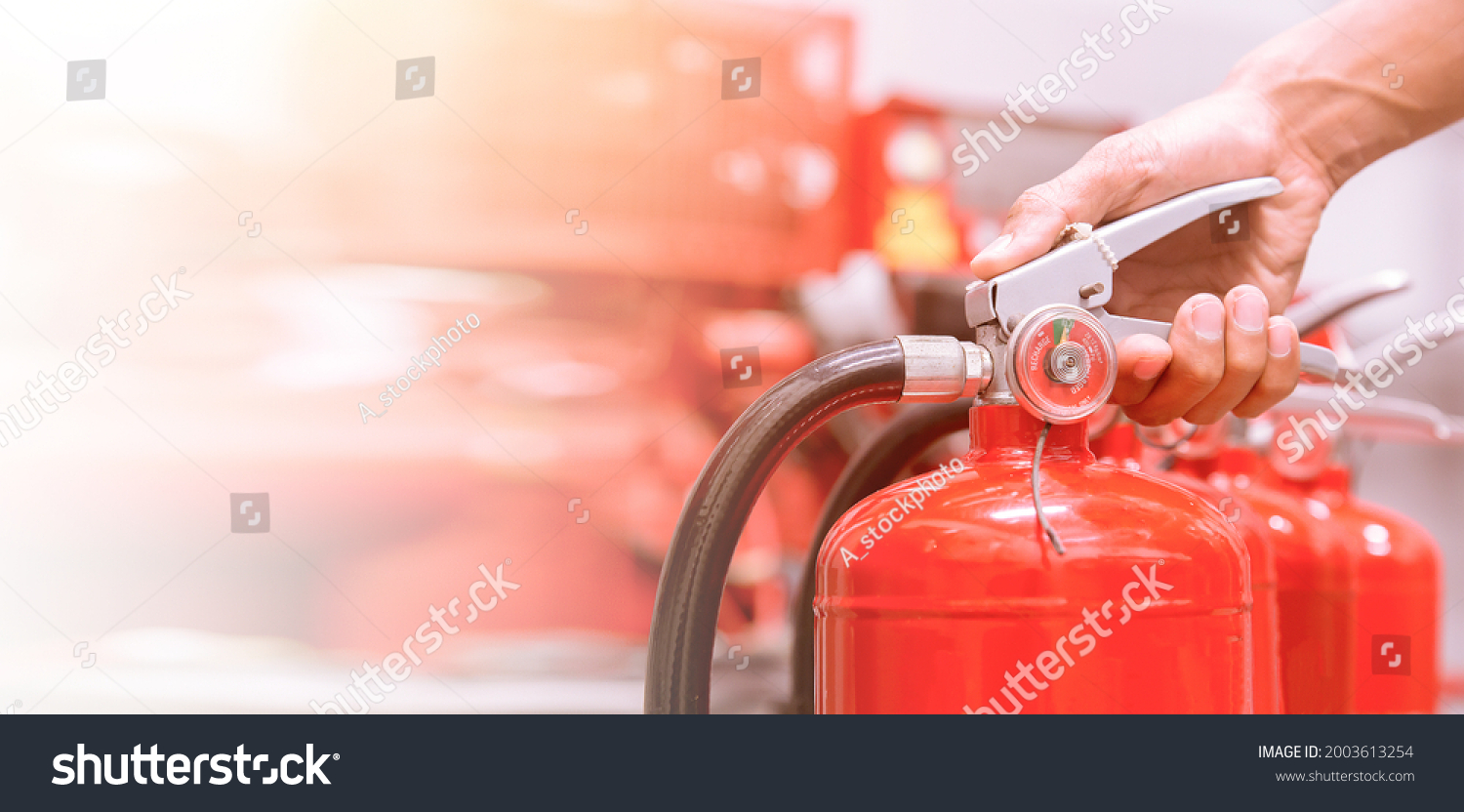 fire extinguishers available in fire emergencies. #2003613254