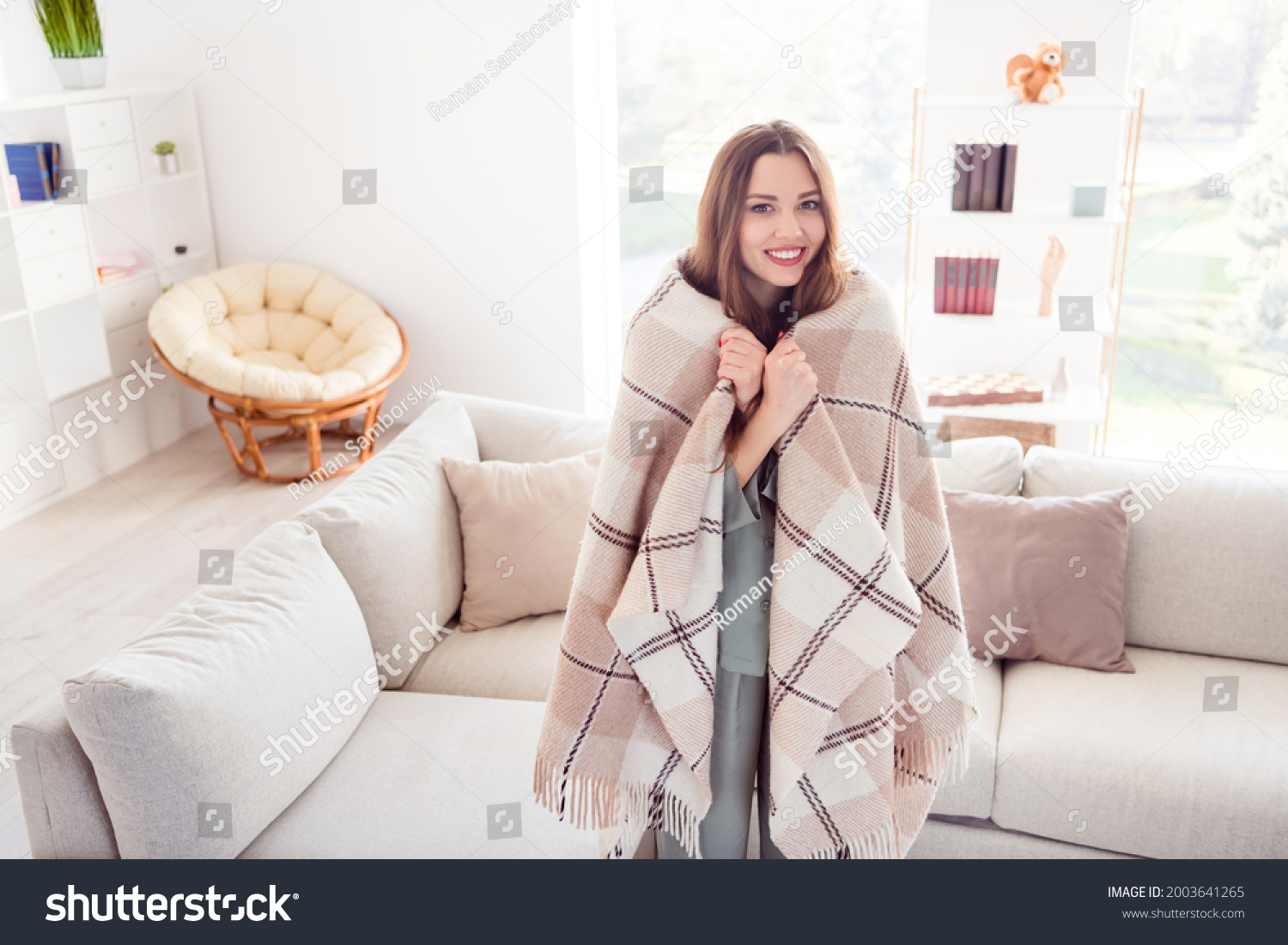 Photo of young attractive lovely girl happy positive smile cover herself plaid comfort warm standing home #2003641265