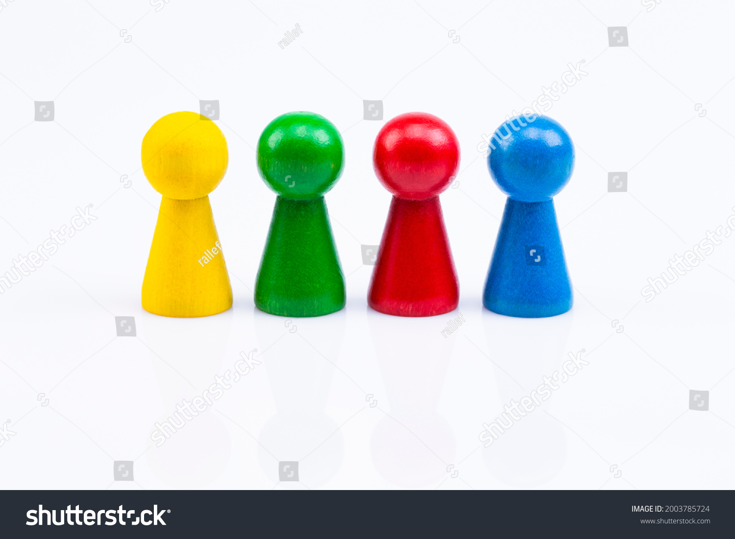 The different colored wooden figures isolated on white background #2003785724